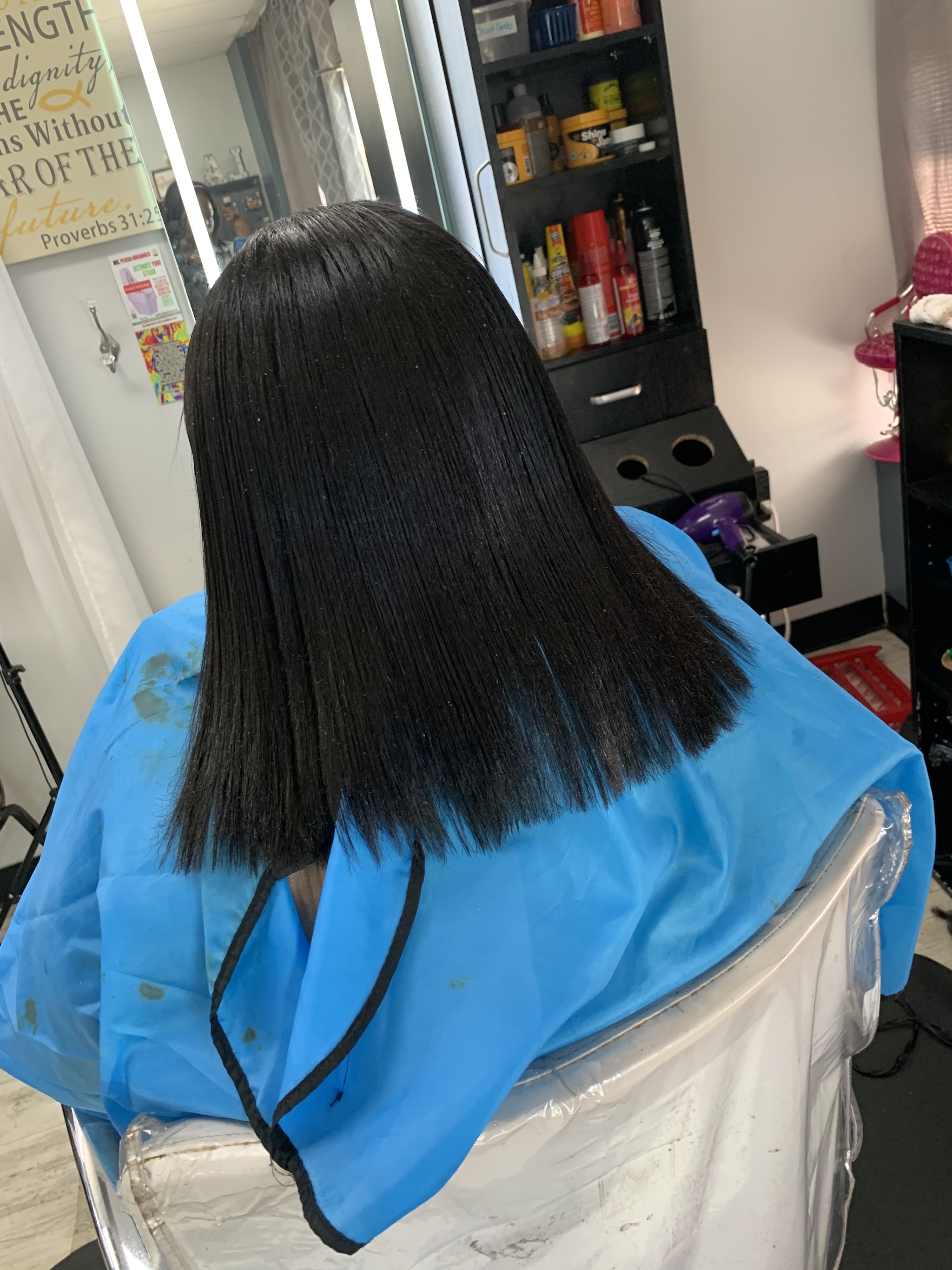 A smooth, shoulder-length straight cut