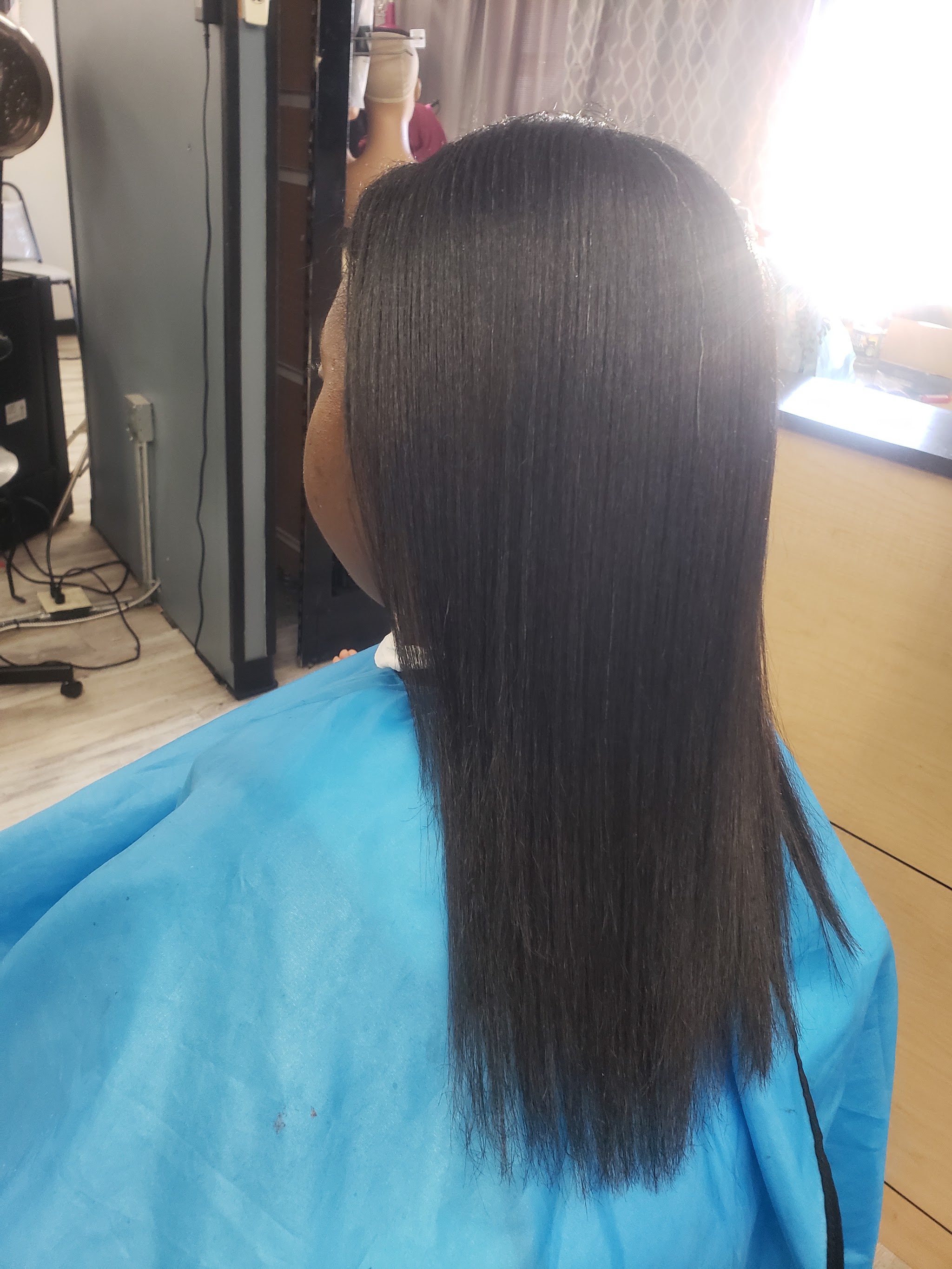 Long straight hair after a silk wrap, seen from behind
